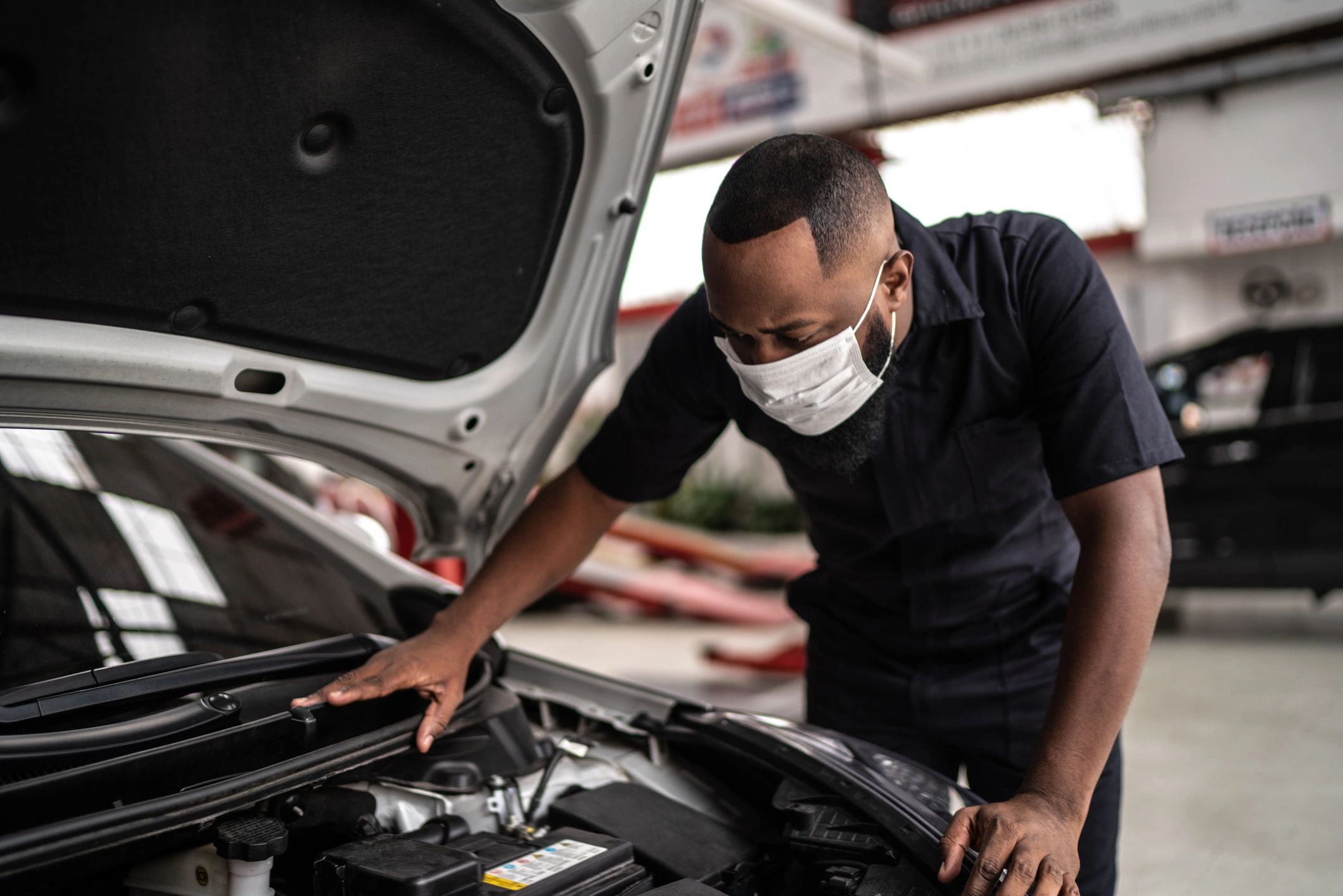 Auto mechanic working in a repair shop